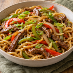 AI illustration of noodles with sliced beef, red and green peppers and spring onion.